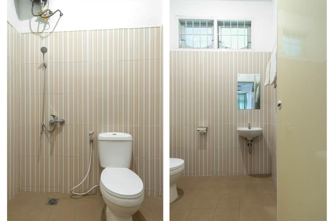 Отель Oyo Living 2843 Raz House Syariah Медан Экстерьер фото